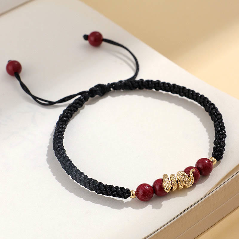Braccialetto intrecciato di protezione con corda dell'anno del serpente fatto a mano in cinabro Buddha Stones