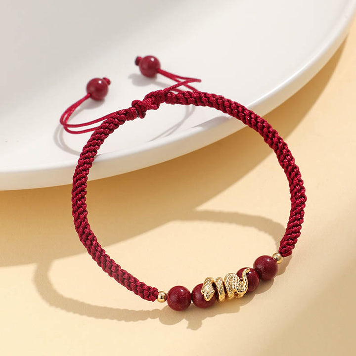 Braccialetto intrecciato di protezione con corda dell'anno del serpente fatto a mano in cinabro Buddha Stones