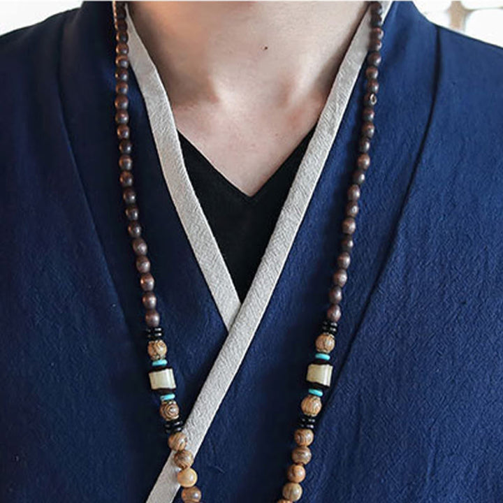 Camicia a maniche lunghe color block autunnale Buddha Stones in lino con lacci Abbigliamento uomo