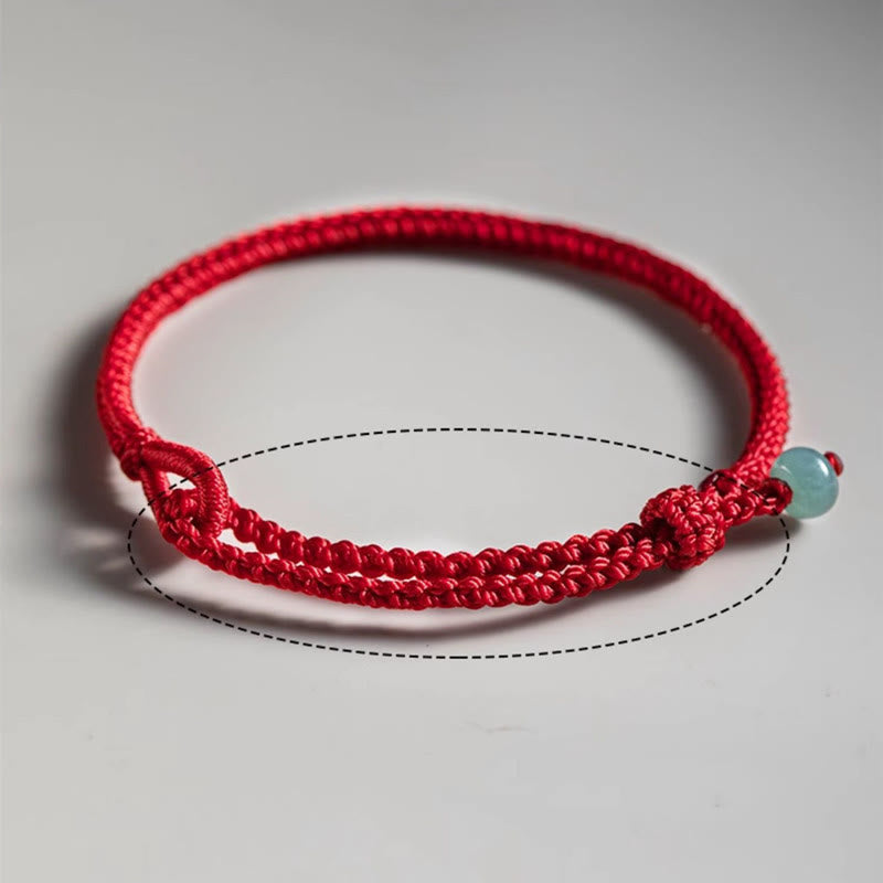 Braccialetto di collegamento in giada con filo rosso Buddha Stones
