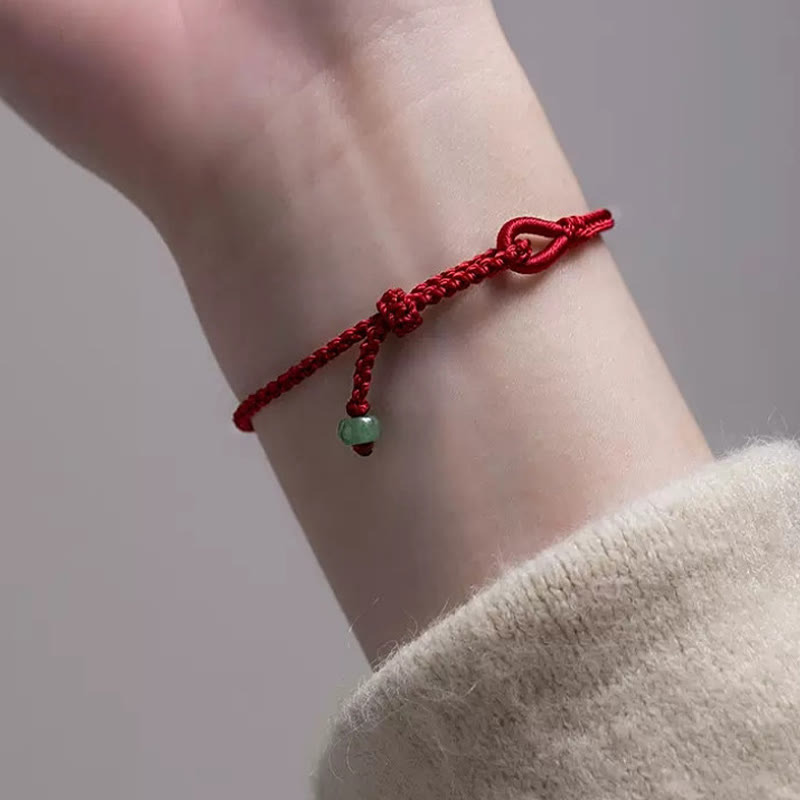 Braccialetto di collegamento in giada con filo rosso Buddha Stones