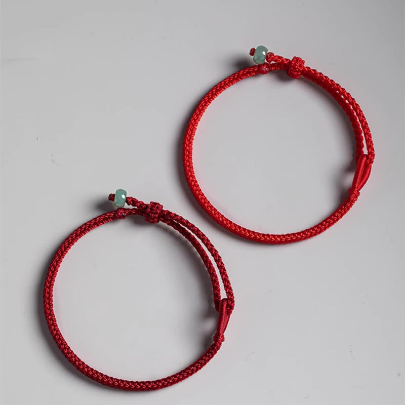 Braccialetto di collegamento in giada con filo rosso Buddha Stones