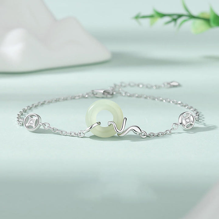 Braccialetto portafortuna dell'anno del serpente con fibbia della pace in argento sterling 925 e giada di Hetian Buddha Stones