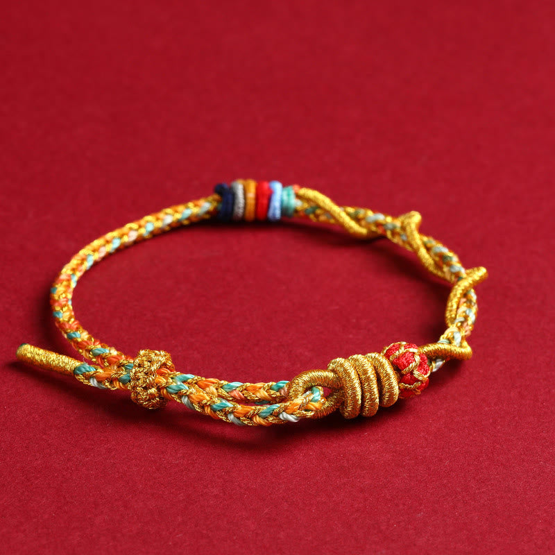 Braccialetto intrecciato di protezione dell'anno del serpente con corda rossa Buddha Stones