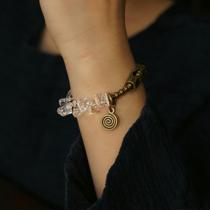 Bracciale Buddha Stones con cristalli bianchi irregolari e purezza del rame