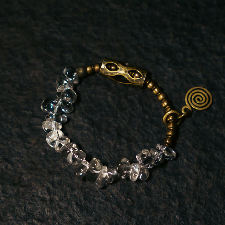 Bracciale Buddha Stones con cristalli bianchi irregolari e purezza del rame