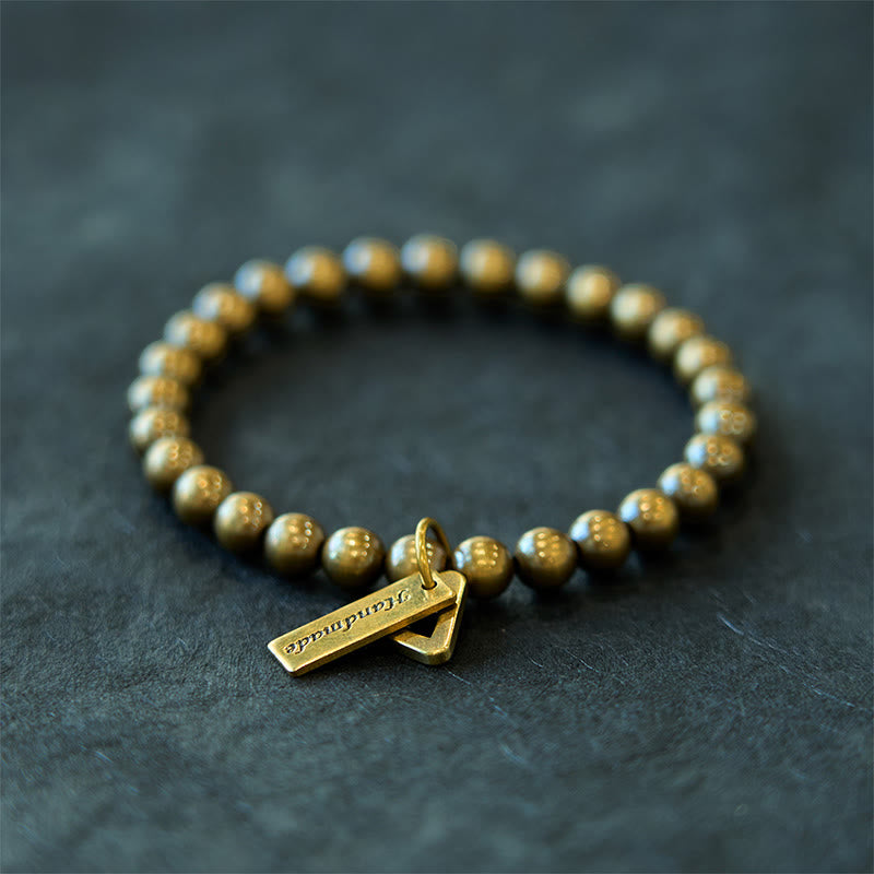 Braccialetto di equilibrio con perline di rame Buddha Stones