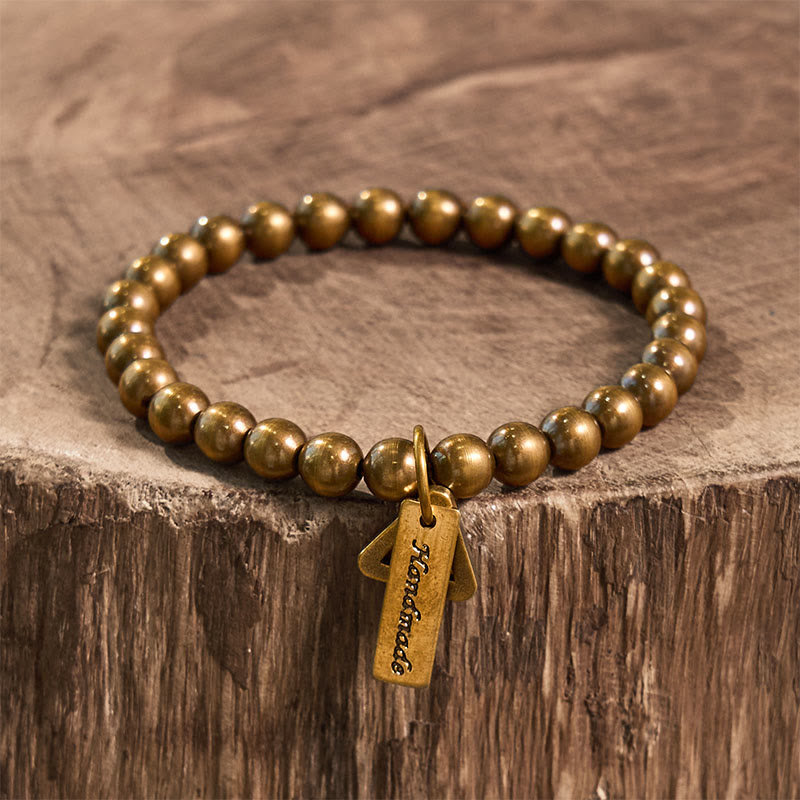 Braccialetto di equilibrio con perline di rame Buddha Stones