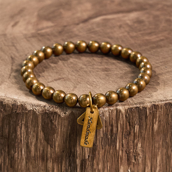 Braccialetto di equilibrio con perline di rame Buddha Stones