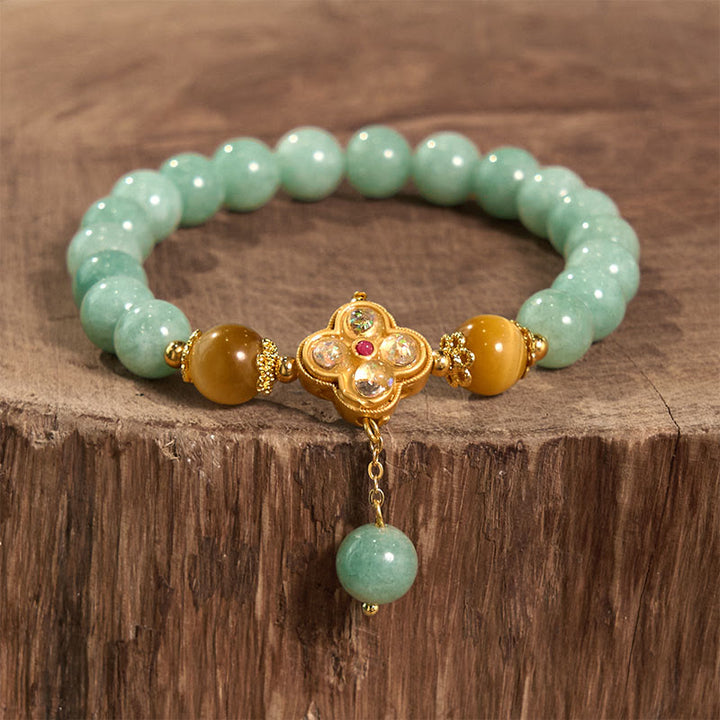 Braccialetto della prosperità con occhio di tigre giallo e giada Buddha Stones