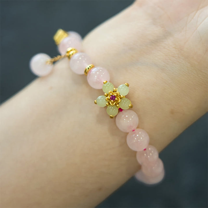 Braccialetto Buddha Stones con fiore di citrino e cristallo rosa