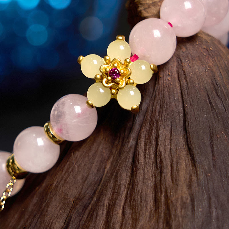 Braccialetto Buddha Stones con fiore di citrino e cristallo rosa