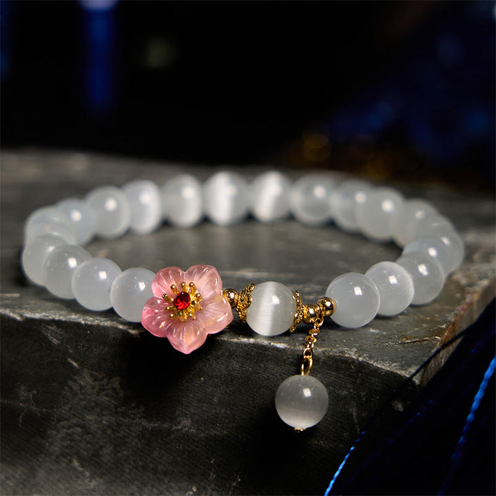 Braccialetto di supporto con fiori rosa e occhio di gatto in crisoberillo Buddha Stones