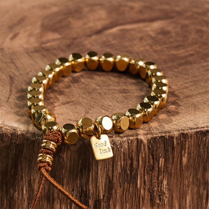 Braccialetto di buona fortuna e cura di sé con corda di rame Buddha Stones