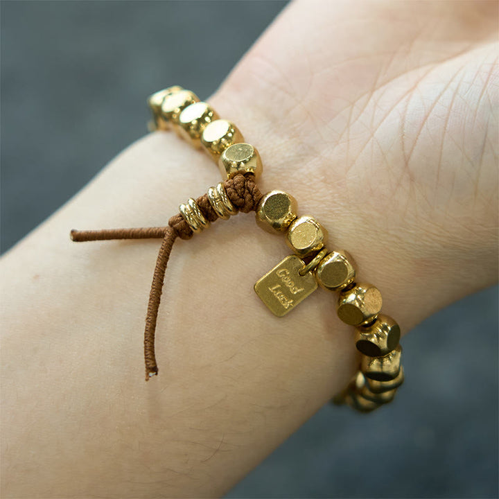 Braccialetto di buona fortuna e cura di sé con corda di rame Buddha Stones
