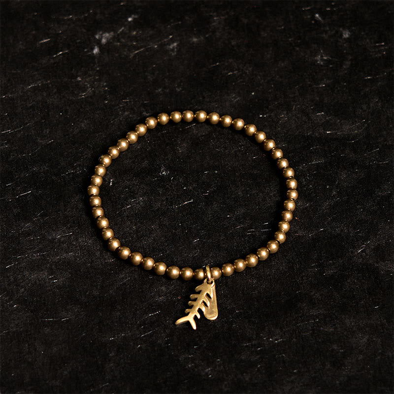 Braccialetto curativo in ottone, rame e ossa di pesce Buddha Stones. - image 1