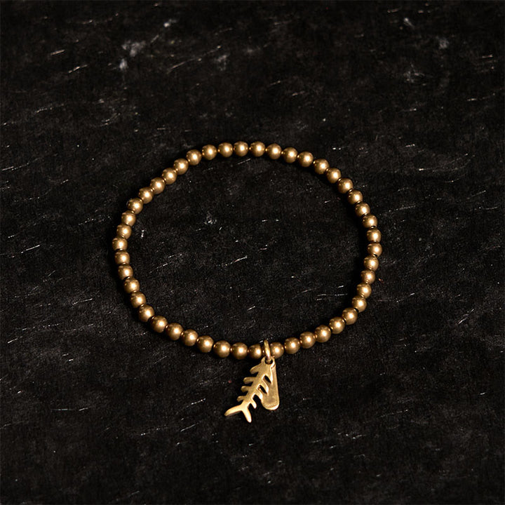 Braccialetto curativo in rame con ossi di pesce Buddha Stones