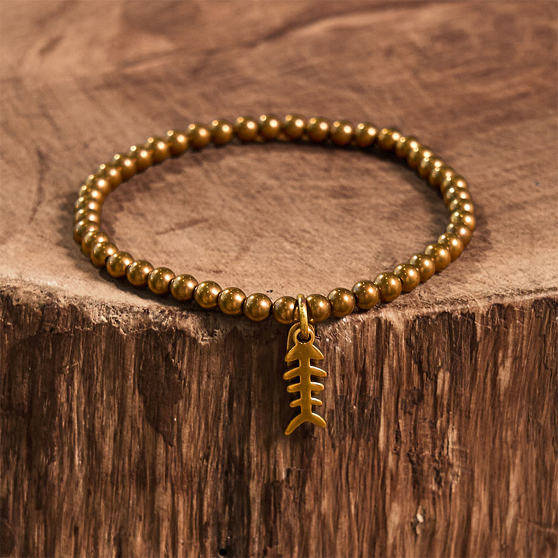 Braccialetto curativo in rame con ossi di pesce Buddha Stones
