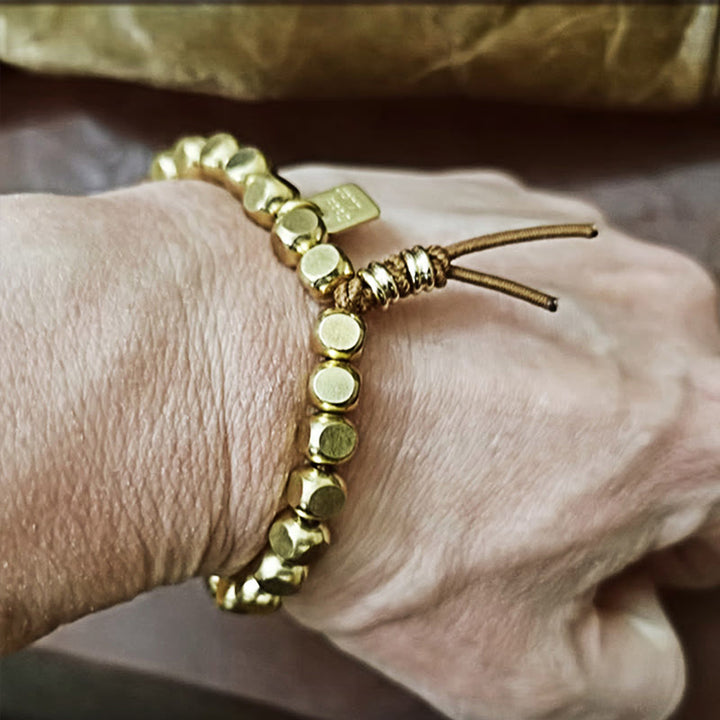 Braccialetto di buona fortuna e cura di sé con corda di rame Buddha Stones
