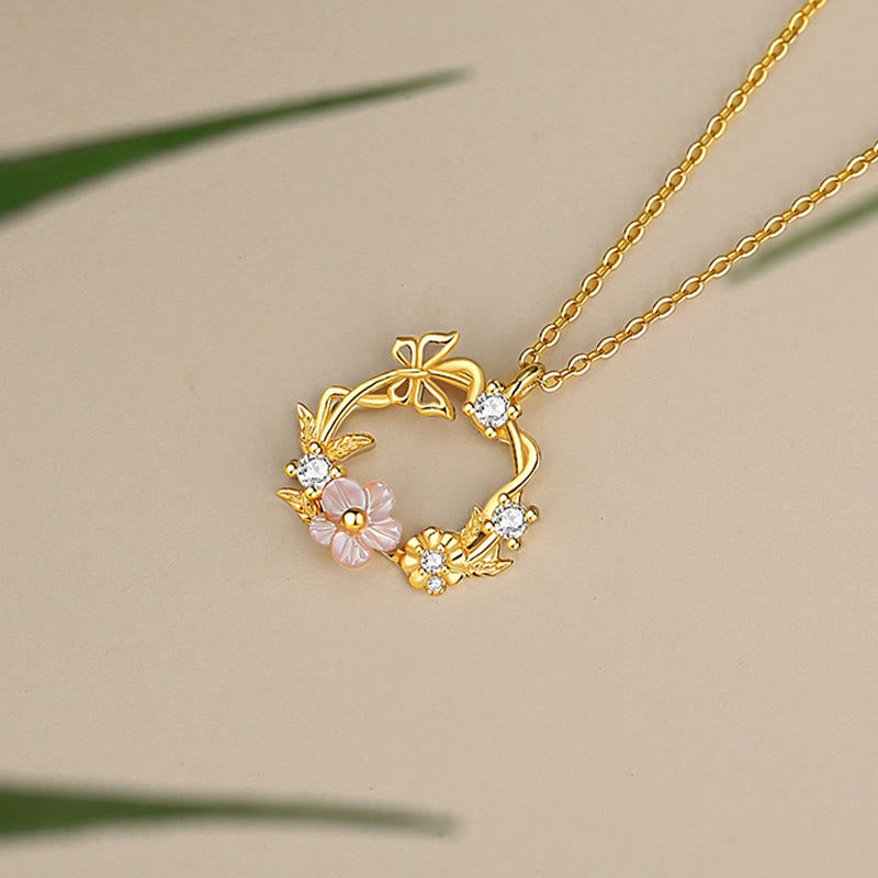 Collana con ciondolo a forma di farfalla con fiore di pesco e zirconi cubici in argento sterling 925 Buddha Stones