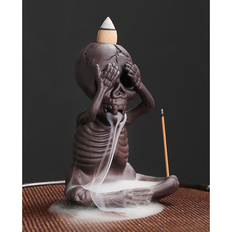 Buddha Stones Piccolo teschio Fantasma Argilla viola Fontana di fumo a riflusso Bruciatore di incenso della pace Decorazione
