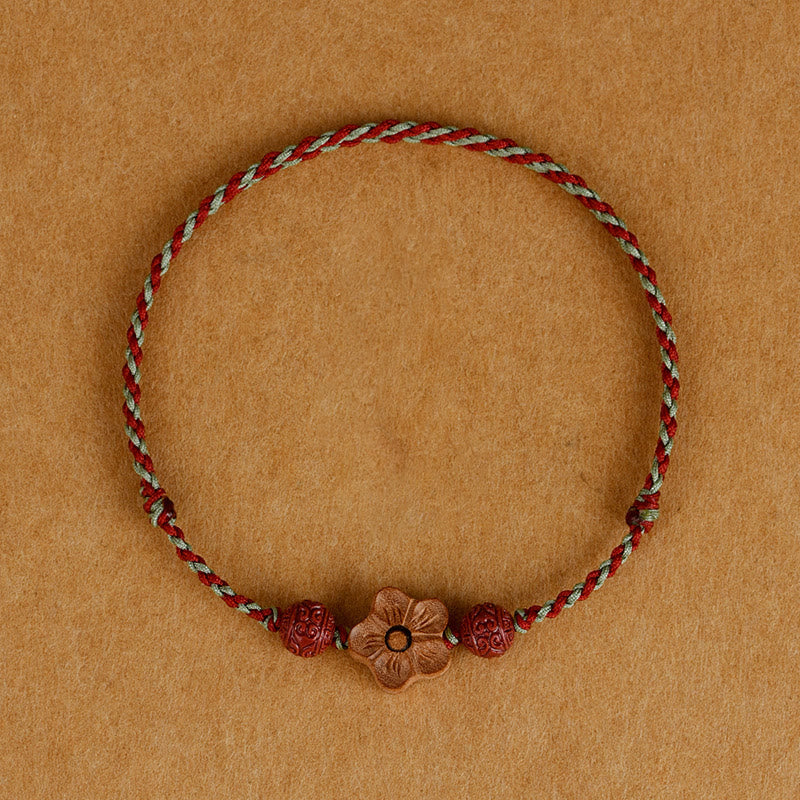 Braccialetto alla caviglia con corda della ricchezza in legno di Buddha Stones, fiori di pesco, cinabro