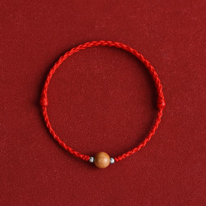 Braccialetto alla caviglia intrecciato con perline di legno di pesca naturale Buddha Stones