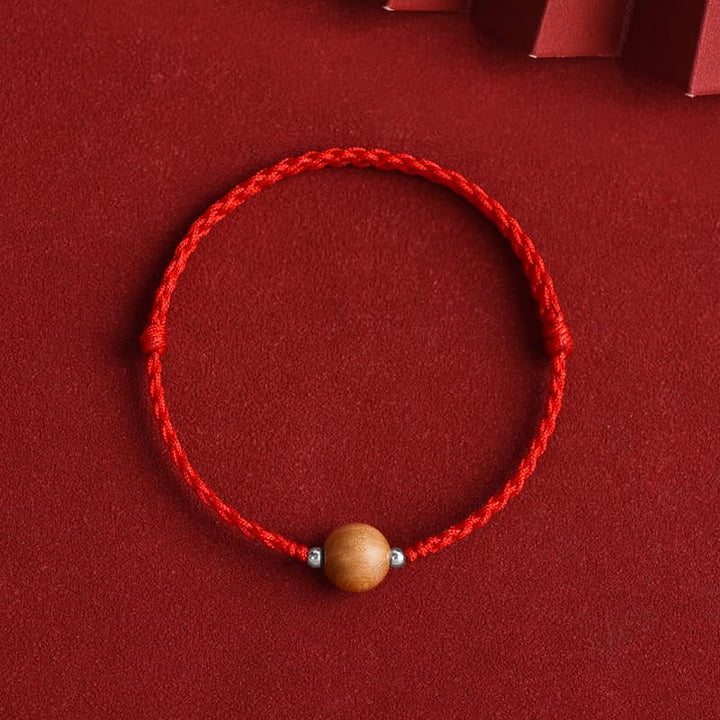 Braccialetto alla caviglia intrecciato con perline di legno di pesca naturale Buddha Stones