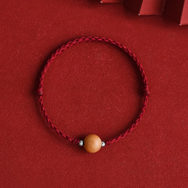 Braccialetto alla caviglia intrecciato con perline di legno di pesca naturale Buddha Stones