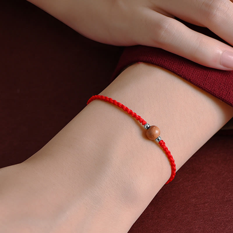 Braccialetto alla caviglia intrecciato con perline di legno di pesca naturale Buddha Stones