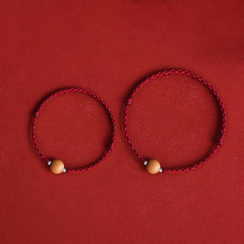 Braccialetto alla caviglia intrecciato con perline di legno di pesca naturale Buddha Stones