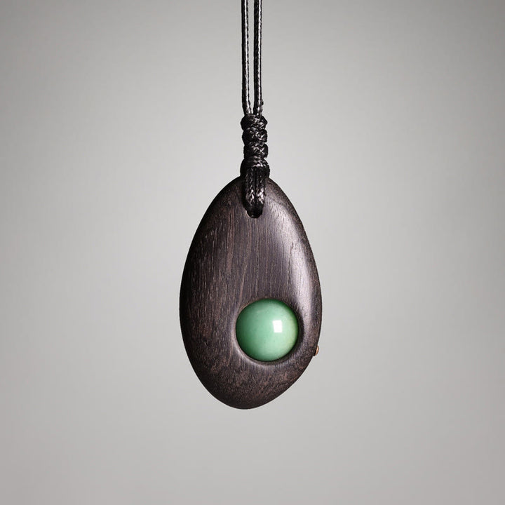 Collana pendente Buddha Stones, legno di ebano, avventurina verde, pace e calma