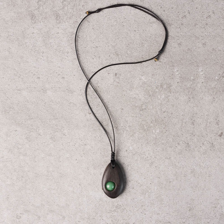 Collana pendente Buddha Stones, legno di ebano, avventurina verde, pace e calma