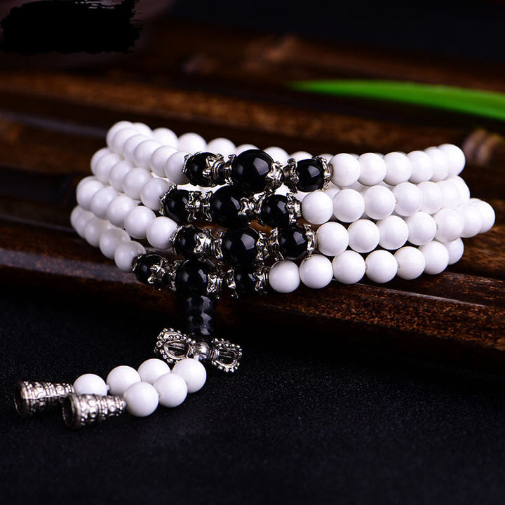 Buddha Stones 108 Mala Beads Porcellana bianca Sei parole vere 'Om Mani Padme Hum' Bracciale della pazienza