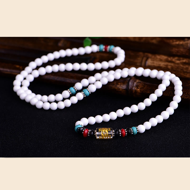 Buddha Stones 108 Mala Beads Porcellana bianca Sei parole vere 'Om Mani Padme Hum' Bracciale della pazienza