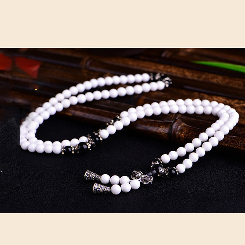 Buddha Stones 108 Mala Beads Porcellana bianca Sei parole vere 'Om Mani Padme Hum' Bracciale della pazienza