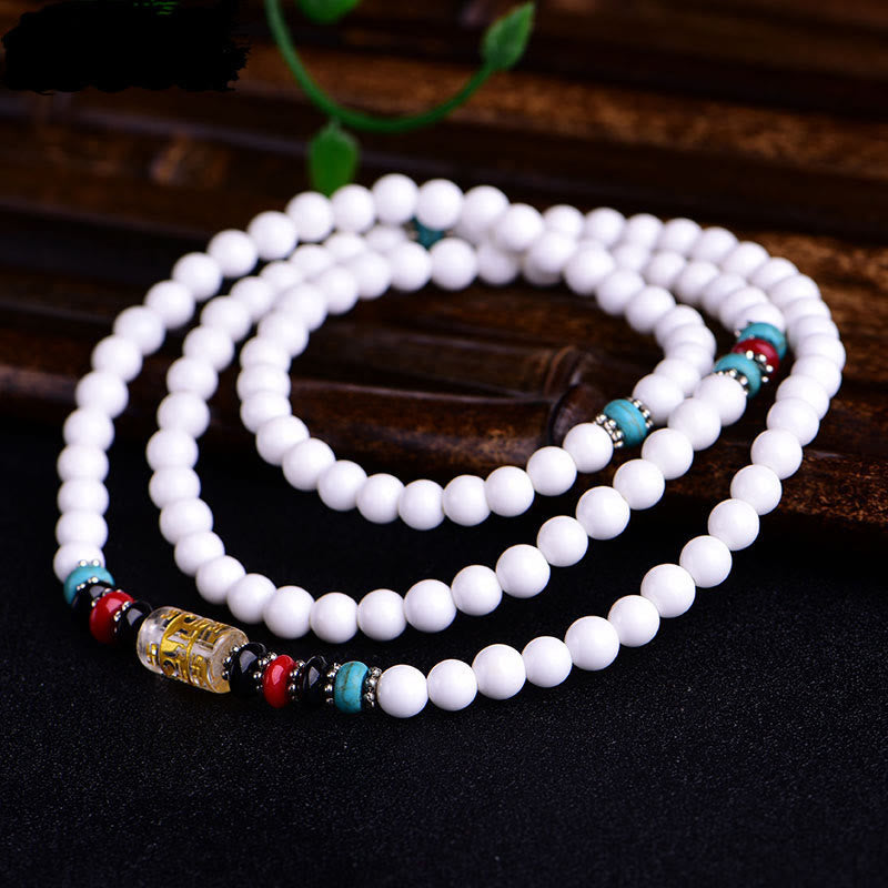 Buddha Stones 108 Mala Beads Porcellana bianca Sei parole vere 'Om Mani Padme Hum' Bracciale della pazienza
