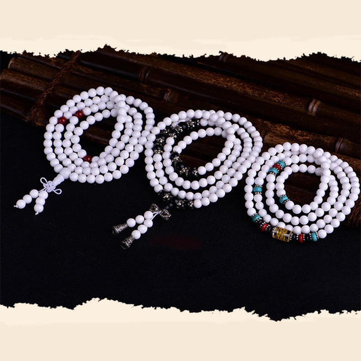 Buddha Stones 108 Mala Beads Porcellana bianca Sei parole vere 'Om Mani Padme Hum' Bracciale della pazienza