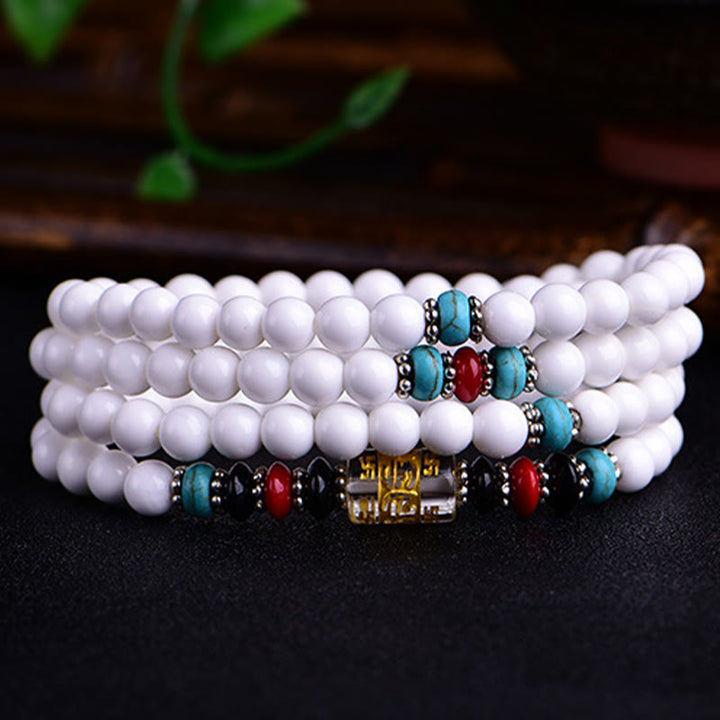 Buddha Stones 108 Mala Beads Porcellana bianca Sei parole vere 'Om Mani Padme Hum' Bracciale della pazienza