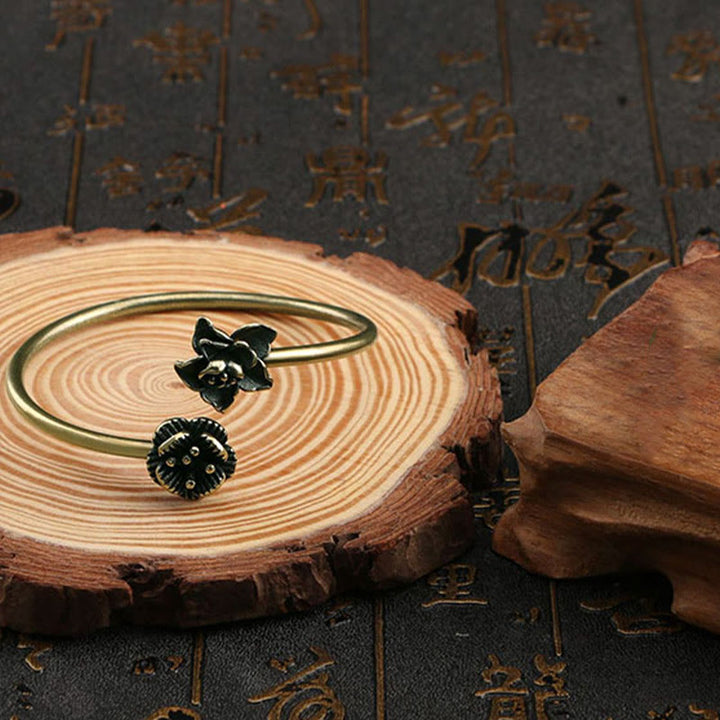 Braccialetto di guarigione in ottone e rame con Buddha Stones di pesco