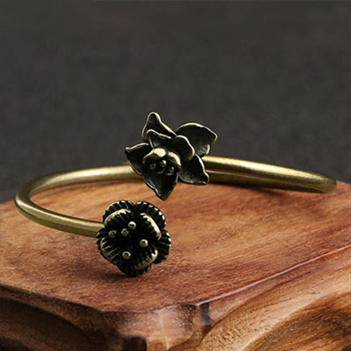 Braccialetto di guarigione in ottone e rame con Buddha Stones di pesco