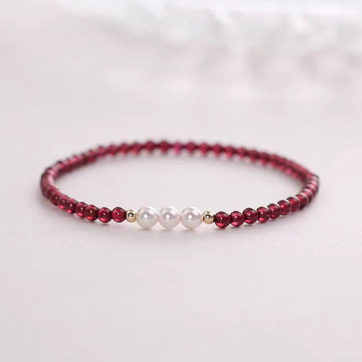 Braccialetto di protezione con piccole perle di granato naturale Buddha Stones