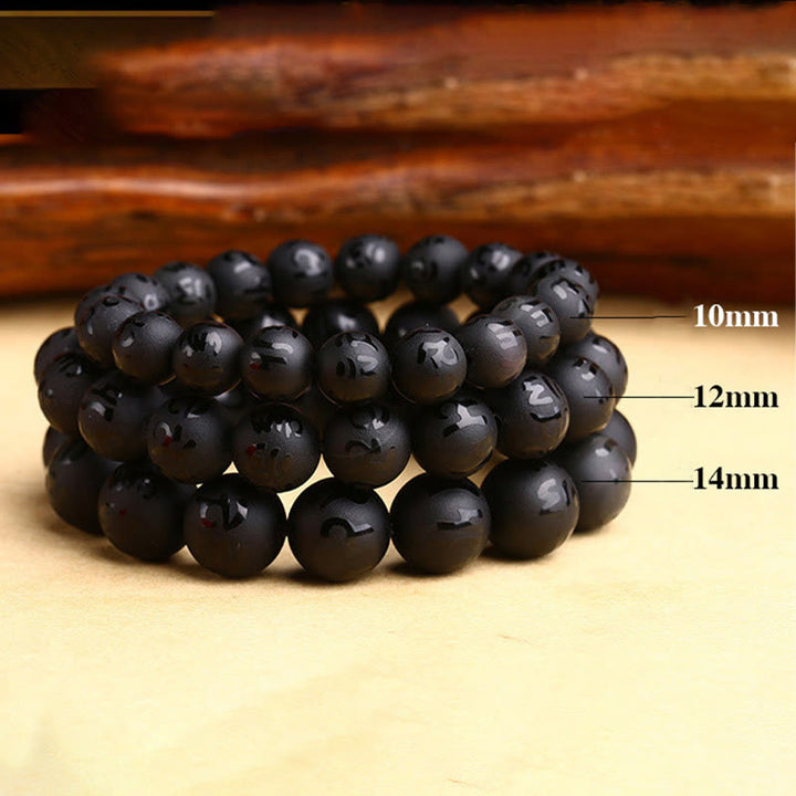 Braccialetto di protezione intagliato in onice nero naturale Om Mani Padme Hum Buddha Stones