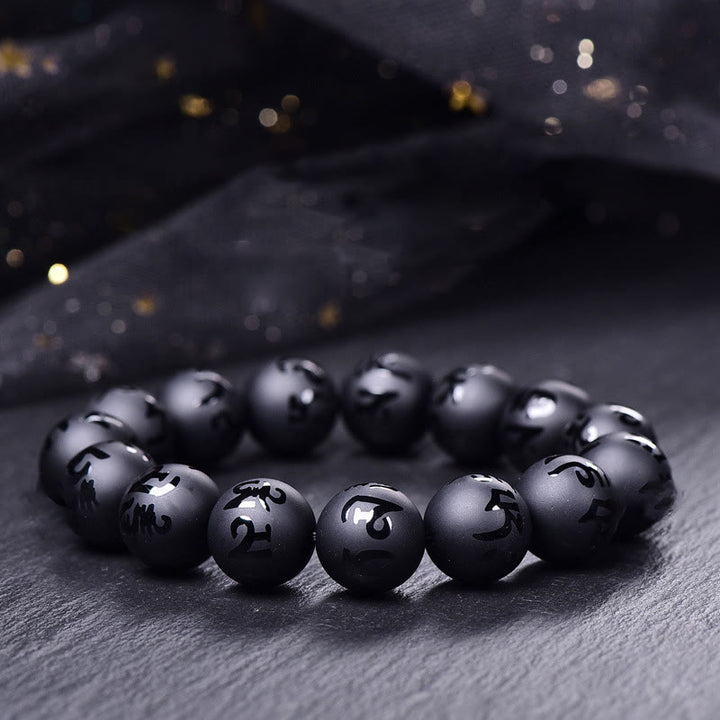 Braccialetto di protezione intagliato in onice nero naturale Om Mani Padme Hum Buddha Stones