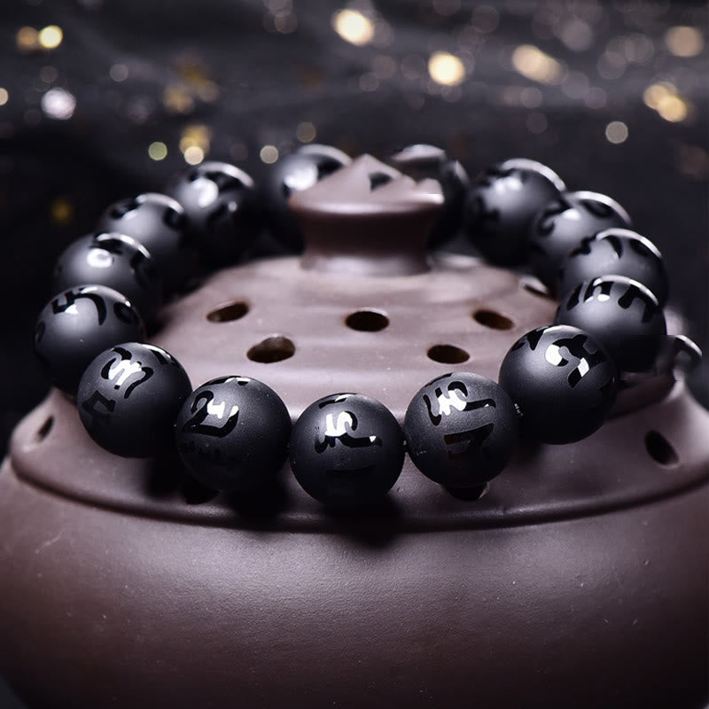 Braccialetto di protezione intagliato in onice nero naturale Om Mani Padme Hum Buddha Stones