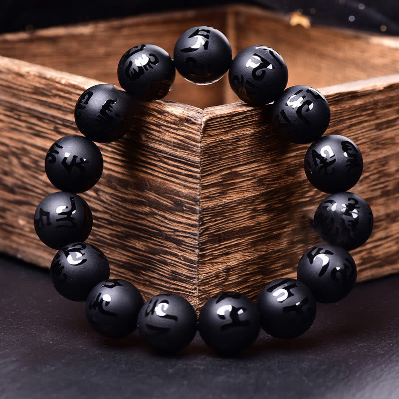 Braccialetto di protezione intagliato in onice nero naturale Om Mani Padme Hum Buddha Stones