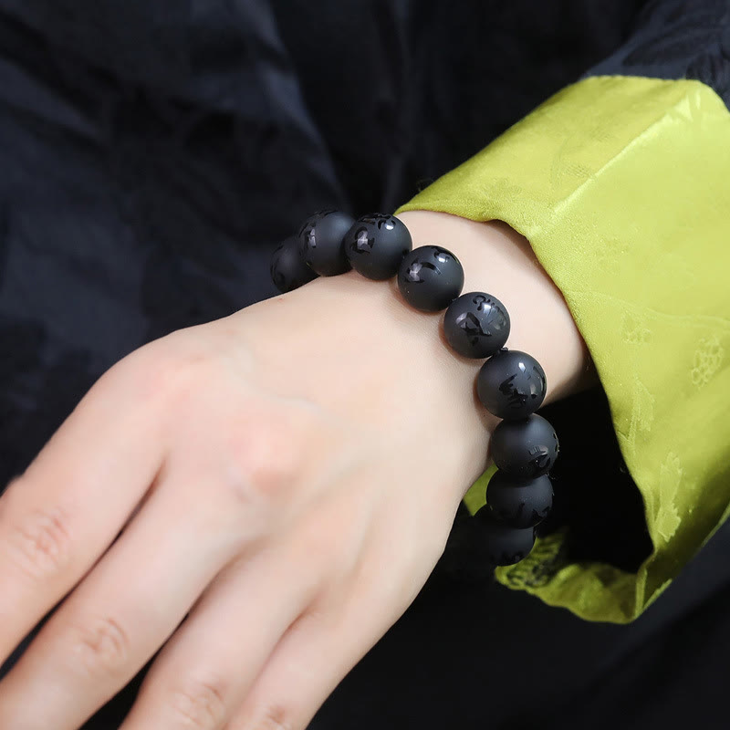 Braccialetto di protezione intagliato in onice nero naturale Om Mani Padme Hum Buddha Stones