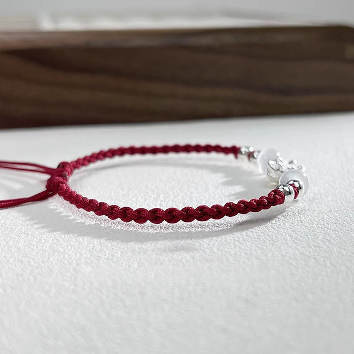 Braccialetto di protezione con perline occhio di gatto in argento sterling 999 con motivo a loto Buddha Stones
