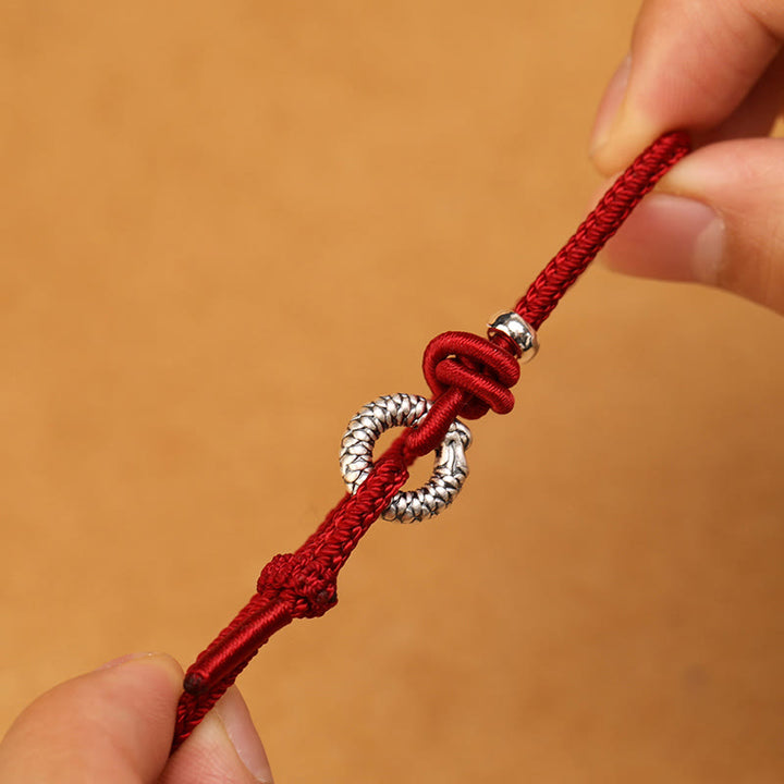 Braccialetto portafortuna con fibbia della pace dell'anno del drago in argento sterling 999 Buddha Stones