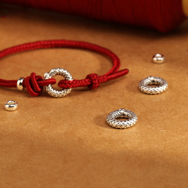 Braccialetto portafortuna con fibbia della pace dell'anno del drago in argento sterling 999 Buddha Stones